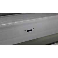 Centre d'usinage CNC 4 axes OUWO 7000 mm pour le perçage, le fraisage et le chanfreinage de profilés en aluminium robustes pour l'industrie des fenêtres et des portes