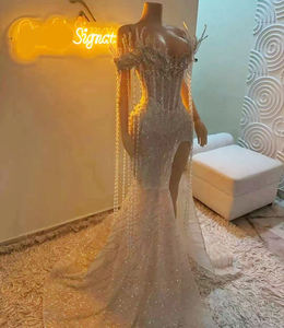 Abiti da sposa Aso Ebi: Modelli da donna Sea Girl Abiye con spacco laterale, perline, pizzo e cristalli, ideali per compleanni e secondi ricevimenti - Product Image 1