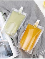 Vente en gros de sachets de boisson en plastique transparent coréen personnalisés de 350 ml et 500 ml, sachets de jus de fruits, de confiture, de liquide avec bec verseur