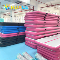 Tapis de gymnastique gonflable sur mesure avec coussin d'atterrissage pour la pratique à domicile