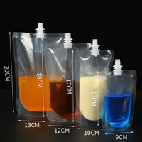 Sachets d'emballage personnalisés en PET transparent de qualité alimentaire avec bec verseur vertical extrudé pour jus et liquides, idéaux pour les boissons