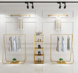 Estante de pared de Ropa de Oro boutique de lujo moderno Constom con mesa de anidación estantería de ropa ideal para muebles de <span class=keywords><strong>tienda</strong></span> de ropa - Product Image 1