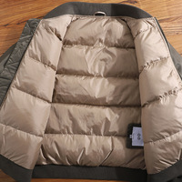 Blouson d'aviateur rembourré en duvet noir vierge surdimensionné à la conception personnalisée pour hommes OEM