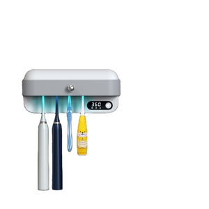 Support mural stérilisateur UV pour brosses à dents à usage domestique avec ventilateur, chauffage et séchage intégrés - Product Image 1