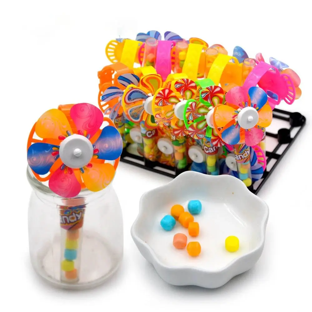 Веселая игрушка в форме мельницы, конфеты с компрессом