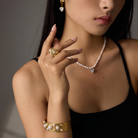 Bague tendance de forme ronde en acier inoxydable plaqué or 18 carats avec décoration en perle pour femme, bijoux imperméables