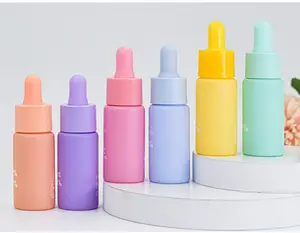 Arcobaleno di lusso cosmetico siringa bottiglia siero 20mL etichettatura serigrafia essenza olio essenziale contagocce in vetro per la cura del viso