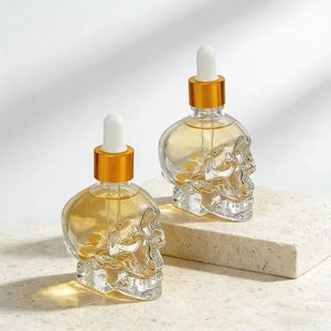 Wholesale 30ml 50ml 100ml <strong>Skull</strong> Shaped Small <strong>Glass</strong> Dropper <strong>Bottles</strong> with Screw Lids Custom Label Durable for Skin Care Serum - Product Image 1