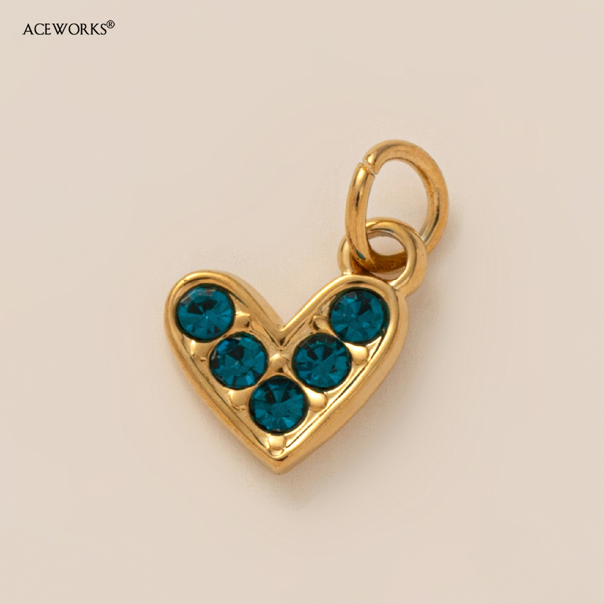 Pendentif Mini coeur zircon-diamant bleu doré