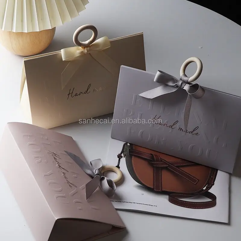 Luxuriöse kleine schwarze Schmuck-Geschenkverpackungstaschen handgefertigte wiederverwendbare Einkaufspaket Großhandel Eigenmarke eleganter Tiefdruck