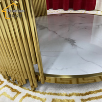 Table basse ronde moderne en acier inoxydable et verre