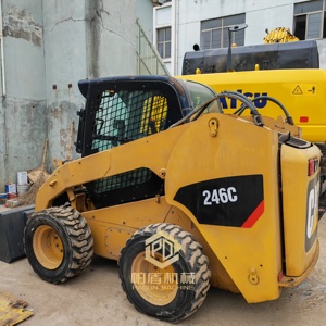 รถตักล้อยาง CAT 246C มือสอง พร้อมอุปกรณ์ขุดดินทั้งสองด้าน เหมาะสำหรับงานก่อสร้าง รถตักล้อยางแบบสกิดสเตียร์ - Product Image 1