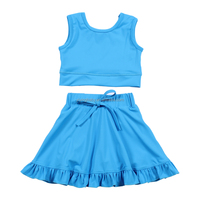 Ensemble de sport 2 pièces respirant pour filles, jupe-short sans couture, idéal pour le tennis et le yoga, vente en gros de haute qualité