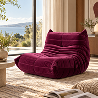 Fauteuil lounge Caterpillar en velours bordeaux, rembourrage dense, toucher doux, soutien ergonomique, qualité durable, confort optimal