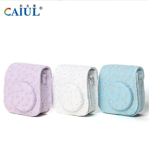 Fournisseur en gros – Sac de protection souple et élégant <span class=keywords><strong>pour</strong></span> <span class=keywords><strong>appareil</strong></span> <span class=keywords><strong>photo</strong></span> <span class=keywords><strong>Instax</strong></span> <span class=keywords><strong>Mini</strong></span> 12/<span class=keywords><strong>11</strong></span>/9, motif floral, avec bandoulière, étui de protection croisé - Product Image 1