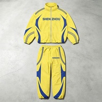 Ensemble de survêtement streetwear OEM personnalisé à rayures contrastées pour homme, ensemble veste coupe-vent surdimensionnée à fermeture éclair intégrale, fabricant