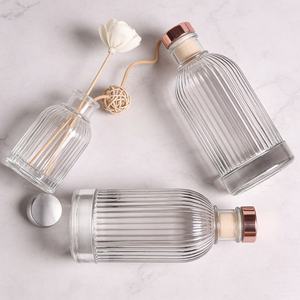 ขวดแก้วเปล่าสำหรับน้ำมันหอมระเหยขนาด 100 มล. พิมพ์ลายสกรีน พร้อมจุกปิด สำหรับใส่ก้านไม้หอม  รับทำโลโก้ตามสั่ง - Product Image 2