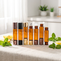 Flacon d'huile essentielle en verre ambré à double tête roll-on de qualité supérieure 10 ml avec diffuseur à bâtonnets et estampage doré pour emballage de parfum et cosmétiques