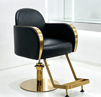 Chaise de barbier haut de gamme avec dossier incurvé et finition dorée élégante pour salon de coiffure professionnel