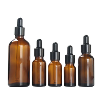 En stock flacon d'huile essentielle de 10 ml/flacons compte-gouttes en verre ambré à l'épreuve des enfants pipette de 10 ml