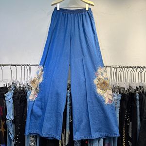 Completo in Denim di Lusso 2026 <span class=keywords><strong>con</strong></span> Camicia a Fiori e Pantaloni a <span class=keywords><strong>Gamba</strong></span> Larga per Donna - Product Image 6