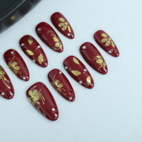 Ongles artificiels faits à la main, petites fleurs rouges festives dorées, vente en gros d'usine réutilisable de haute qualité