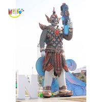 Statues de gardien thaïlandais géant de Bangkok Yaksha gonflable bleu avec pistolet à eau