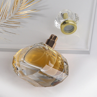 Nouveau design de luxe, flacon de parfum en verre transparent de 100 ml à coupe plate, avec pulvérisateur à pompe, capuchon en acrylique, design effet pierre précieuse, sérigraphie épaisse