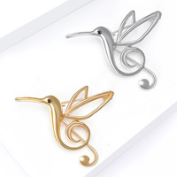 Broche classique en alliage plaqué or moulé sous pression, motif oiseau ajouré et clé de sol, pour la vente en gros de bijoux
