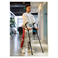 Robot d'exosquelette de membre inférieur d'équipement de réadaptation médicale professionnelle de vente chaude, aide portable de marche