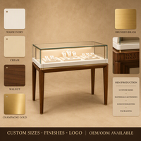 Vitrine de présentation de bijoux haut de gamme, armoire en verre avec pieds en bois et bande LED intégrée pour boutique et magasin de vente de bijoux