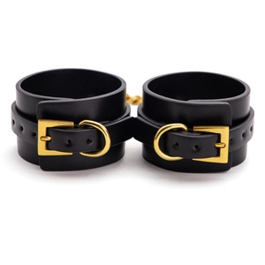 Menottes avec Poignée de Retenue en Cuir - BDSM Boutique