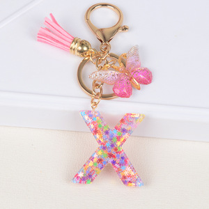 Venta al por mayor nueva moda colorida lentejuelas mariposa borla regalos para niñas mujeres Rosa acrílico 26 letras iniciales en inglés llaveros - Product Image 4
