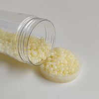 Adhésif thermofusible EVA granule jaune colle thermofusible à réglage rapide pour l'étanchéité de la boîte