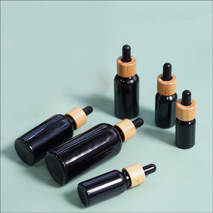 <span class=keywords><strong>Bambou</strong></span> <span class=keywords><strong>noir</strong></span> rond 5ml 10ml 15ml 20ml 30ml 50ml 100ml d'huile de massage étanche compte-gouttes en verre bouteille d'huile à barbe/bouteille en verre - Product Image 2