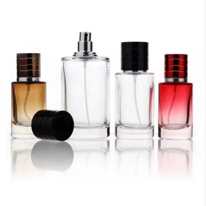 Botella de Perfume de Vidrio con Forma Cilíndrica, Tapa de Rosca, Collar Metálico, Serigrafiada, Tamaños de 30ml/50ml, Envase Vacío para Fragancias - Product Image 1