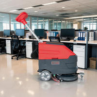 Nettoyeur de sols autoporté certifié CE ISO avec poignée pliable pour un transport facile et un gain de place en stockage