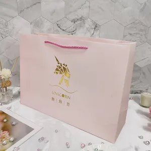 Custom Design Boutique High-end Clothing Packaging Pink Paper Bag With Gold Foil Stamping Logo