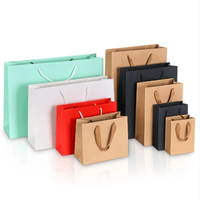 Bolsas de Compra de Papel Brillante Blanco, Negro y Naranja con Estampado en Caliente Personalizado Premium para Empaquetado de Joyería, Cosméticos y Artículos de Lujo