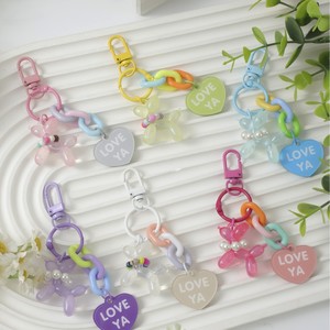 Llavero con colgante de cadena de arcoíris con patrón <span class=keywords><strong>YA</strong></span>, forma de corazón, letra, perro globo y cuentas, ecológico, reutilizable, superventas transfronterizo - Product Image 1