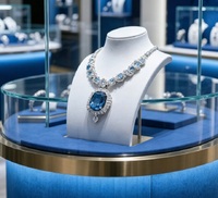 Vitrine à bijoux circulaire double couche GZowin de luxe bleue et dorée avec éclairage LED, design personnalisable, en verre
