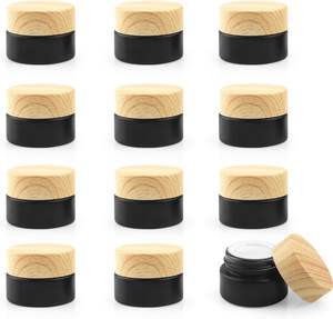 Matte Black Face Cream Containers 5g-100g Round Cosmetic Glass <b>Jars</b> With Plastic Wood Grain Lid - Product Image 1
