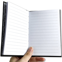 Cahier A6 à couverture rigide Logo argenté chaud Bloc-notes d'affaires avec fond noir pur Ligne horizontale Tissu PVC PP Utilisation scolaire