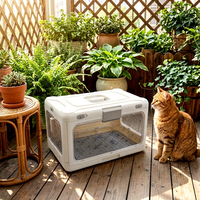 Cage de transport pliable pour animaux de compagnie à quatre roues avec fermeture à bouton, en plastique, respirante toutes saisons, pour sorties, commande en gros usine