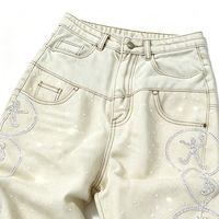 Jean pour homme personnalisé OEM Rock Revival, coupe droite, taille haute double, délavé vintage, effet usé, orné de strass en forme de diamant, en denim évasé