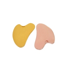Outil de massage Gua Sha en acier inoxydable doré HZ Fashion, forme cœur, pour le soin du visage