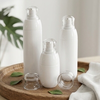 Botella de PETG copoliéster para el cuidado de la piel, 30ml 50ml, con forma de bala, frasco para leche corporal, bomba dosificadora de loción, set de envases vacíos para tratamiento cosmético