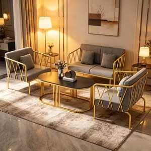 Ensemble de meubles en fer doré de luxe minimaliste moderne, fauteuil de loisirs individuel et canapé de salon avec table basse, modèle tendance - Product Image 1