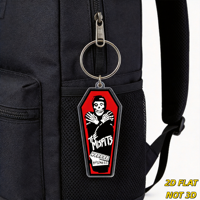 Porte-clés en acrylique en forme de cercueil avec le texte Misfits Horror Business, design gothique rouge et noir pour clés ou sacs