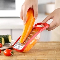 Râpe manuelle multifonctionnelle en acier inoxydable pour fromage, fruits et légumes avec récipient et poignée en PP